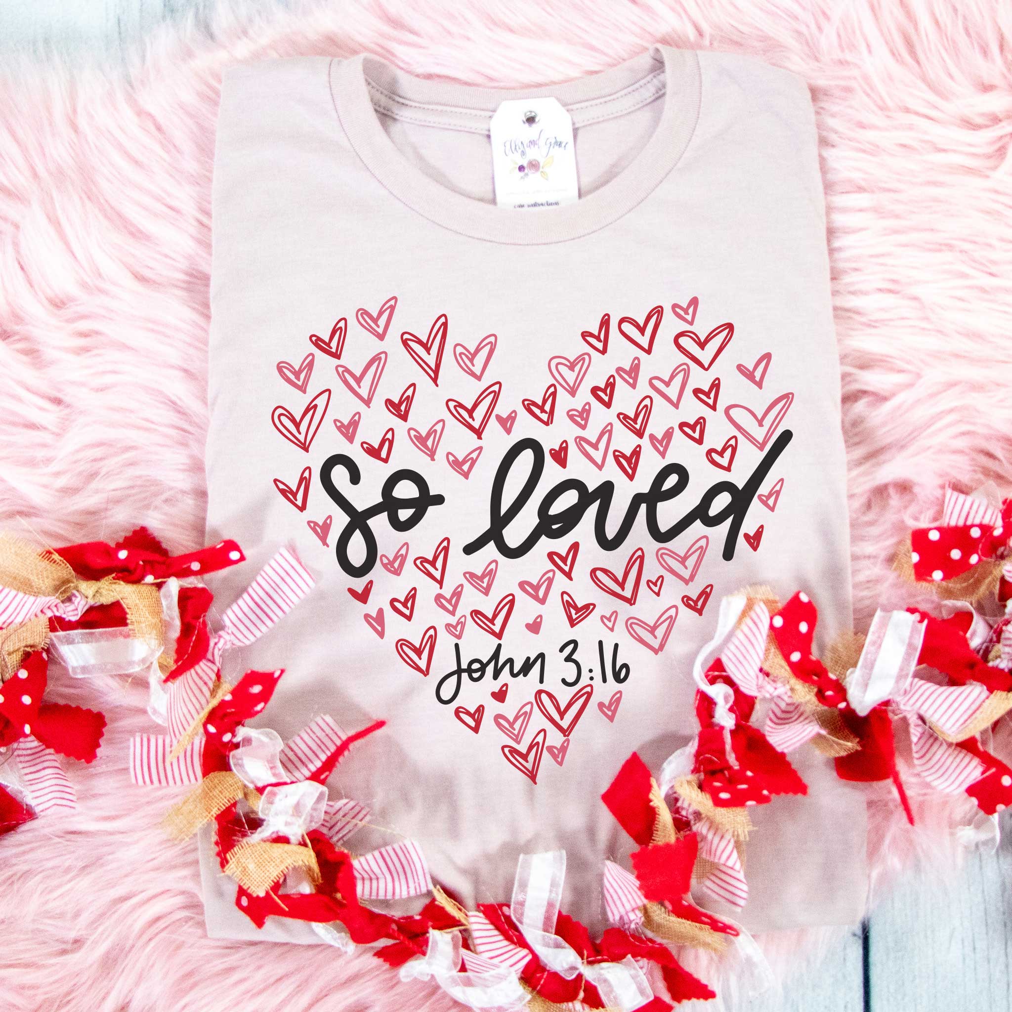 http://ellyandgrace.com/cdn/shop/files/ellyandgrace-3001c-so-loved-heart-multicolor-unisex-shirt-34482579308641.jpg?v=1703699708