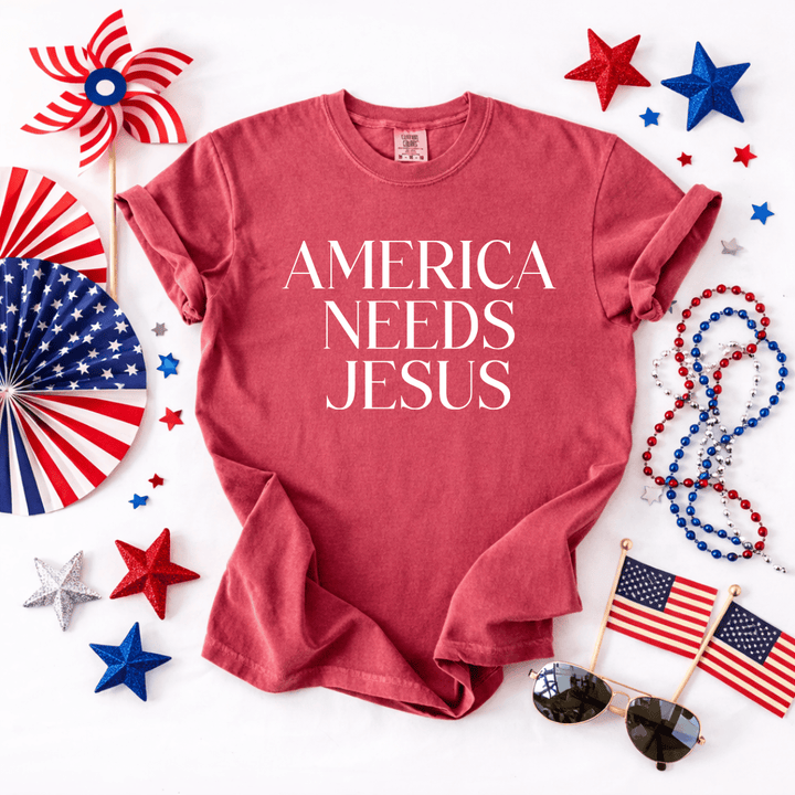 ellyandgrace 1717 America Needs Jesus Comfort Colors Unisex Shirt
