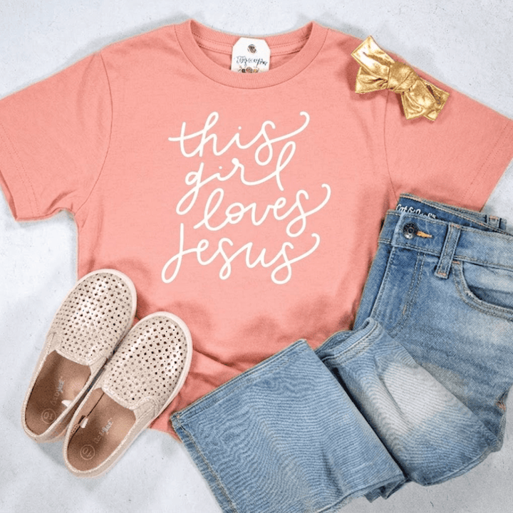 ellyandgrace 6101 This Girl Loves Jesus Unisex Youth Shirt